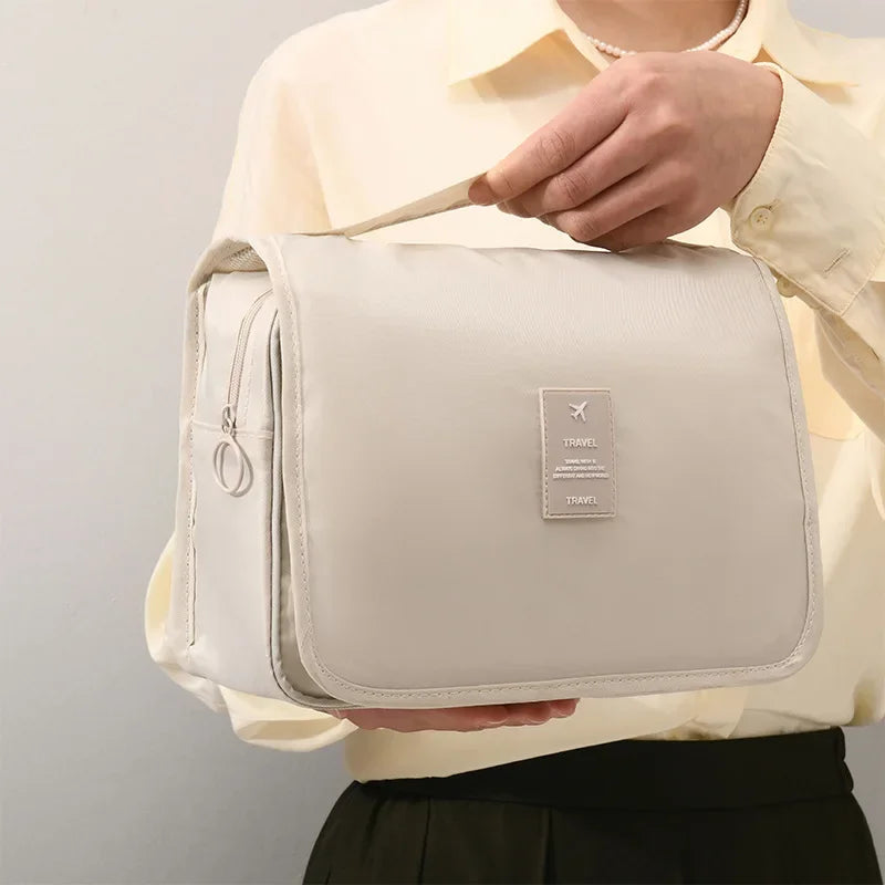 Waterproof travel makeup bag with hook – stylish, compact, organized.