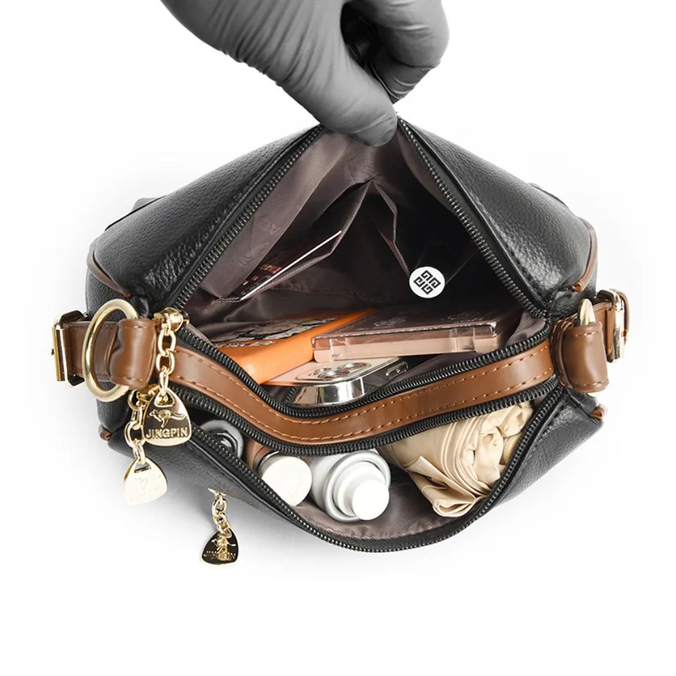 Luxury-inspired handbag for stylish, functional everyday or occasion wear.