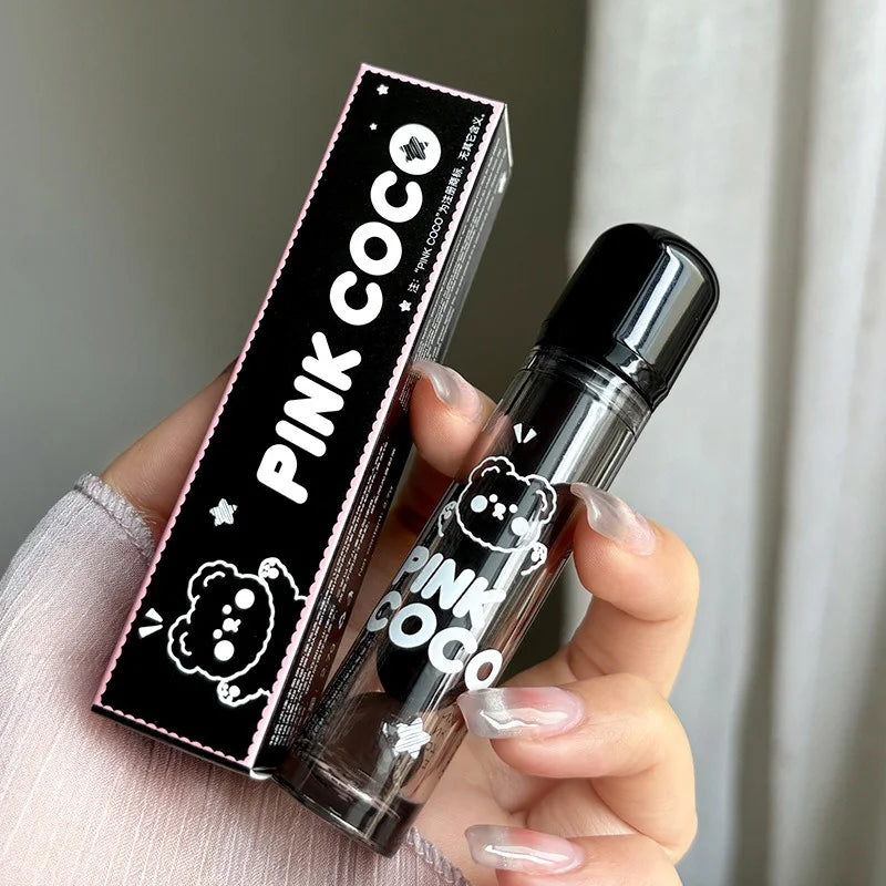 Lip Glaze – shiny nude gloss with cute bear design.