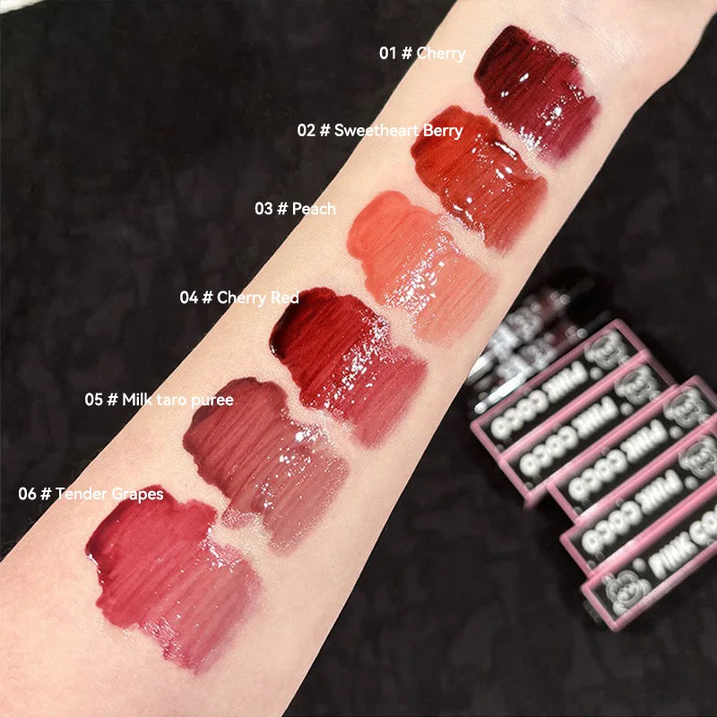 Lip Glaze – shiny nude gloss with cute bear design.