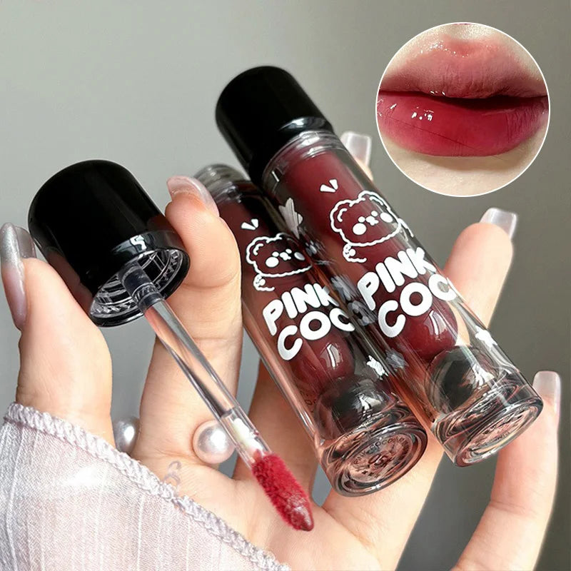 Lip Glaze – shiny nude gloss with cute bear design.
