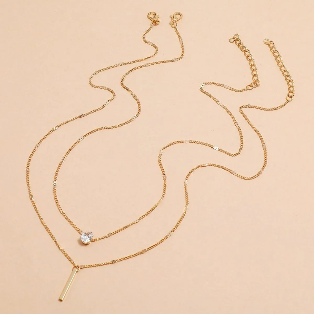 Chic layered necklace – star, heart, and drop details in harmony.